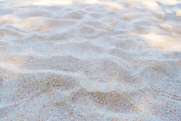 Sand on the beach for background. Brown beach sand texture as background. Close-up