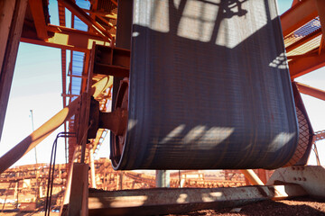 Side view of conveyor belt Gravity Take Up with structure its controlling load loosing or tie conveyor belt movement and transfer raw material into stock yard pile