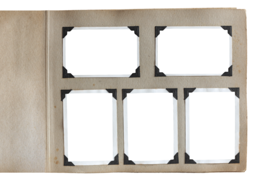 Old fashioned photo album with photo corners and cutouts for image areas