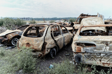 15.07.2022,Bucha  Many shot and destroyed cars of civilians gathered in a car graveyard in Irpin....