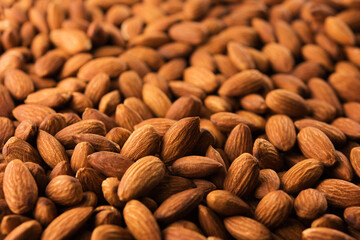 High grade almonds, dry roasted and unsalted. Shot with depth. Shallow depth of field.