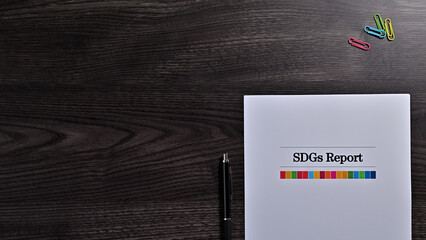 There is a dummy document of SDGs Report on the desk.