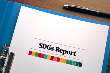 There is a dummy document of SDGs Report on the desk.