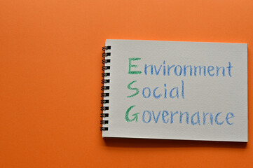 Obraz premium There is sketchbook with an illustration of Environment, Social, Governance.