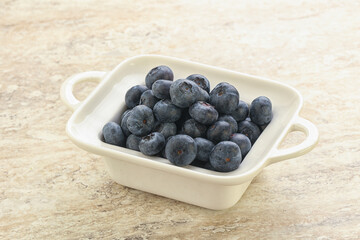 Sweet ripe blueberry heap in the bowl
