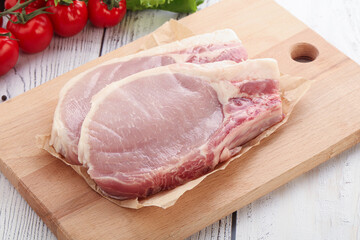 Raw pork t-bone steak for grill