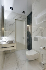 modern bathroom interior, bathroom with white tile with stone texture, glossy porcelain tile in the bathroom