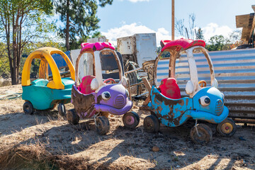 Photograph of children’s toys covered in mud caused by severe flooding in the Hawkesbury river