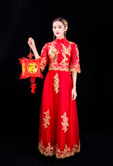 A woman in a red Traditional Chinese wedding dress