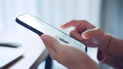 Woman online shopping on smart phone fashion clothes at home