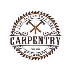 carpentry emblem logo with illustration of saw blade, hammer  and chisel.