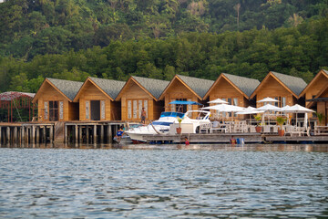 An inn house made of wooden planks on the beach