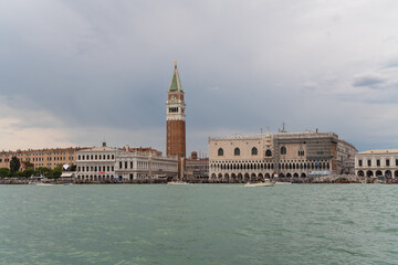 Fototapeta na wymiar Beautiful landscape of Venice from the lagoon with a cloudy sky