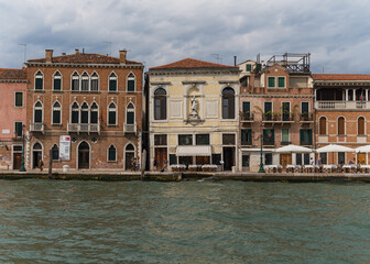 Fototapeta na wymiar Typical Venetian architecture seen from the lagoon in Venice, Italy