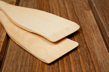 Wooden spatulas for comfortable turning food while cooking.