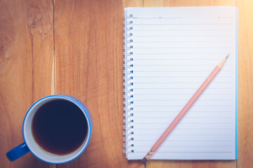coffee cup and notebook