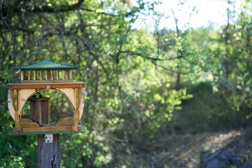Birdhouse in Italian nature landscape