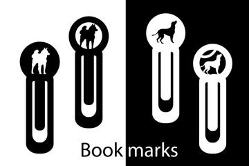 A designer bookmark with a carved dog silhouette. Office tools. Paper cut. Laser cutting.