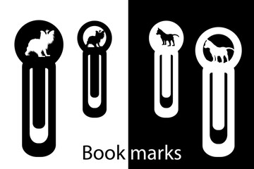 Silhouettes of a dog and a puppy on a bookmark. Office tools. Paper cut. Laser cutting.