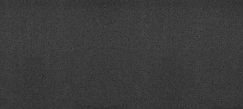 Black paper wide texture. Dark gray fine textured wall widescreen background