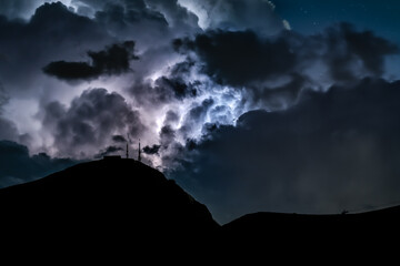 Lightning bolt during nightly thunderstorm in the Dolomites