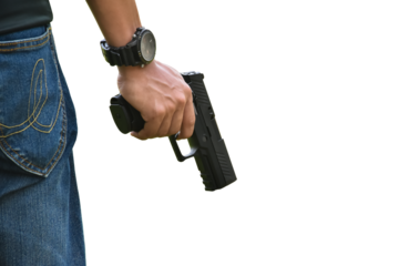 Isolated automatic 9mm pistol gun holding in right hand with clipping paths. concept for using pistol to protect properties and humans in crisis situations around the world.
