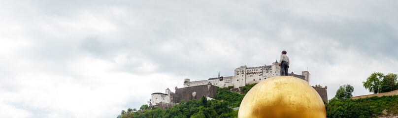 Festung Hohensalzburg fortress with the Sphaera sculpture situated on the Kapitelplatz in the...