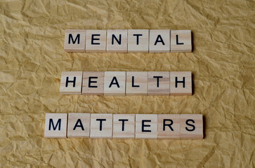 mental health matters text on wooden square, inspiration and motivation quotes