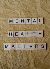 mental health matters text on wooden square, inspiration and motivation quotes