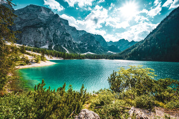 Beautiful view on turquoise Baires Lake in the Dolomite mountains in the afternoon. Braies Lake (Pragser Wildsee, Lago di Braies), Dolomites, South Tirol, Italy, Europe.