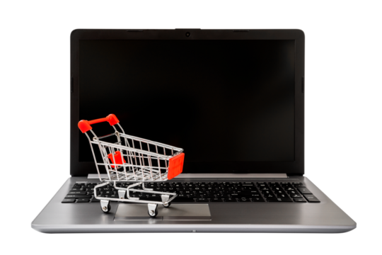 Shopping Online Concept : mini shopping cart on laptop