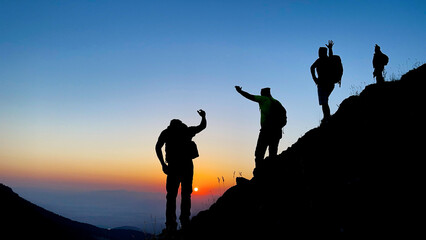 enthusiasm, success and harmonious movements of mountaineers at the summit