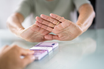 Businessperson Refusing To Take Bribe From Partner