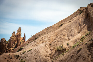 Fototapeta premium Fairytale canyon, Kyrgyzstan, Silk Road, Central Asia, red rocks, colourful