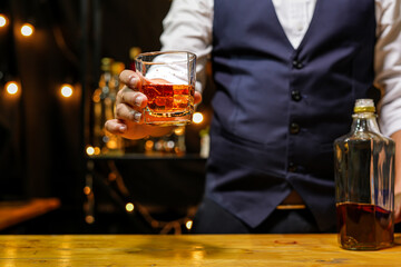 Bartender pouring Whiskey, on  bar,