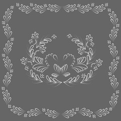 two swans near a flower in a frame of abstract twigs