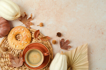 Autumn aesthetic background with coffee cup, cookie and white pumpkin. Top view, flat lay