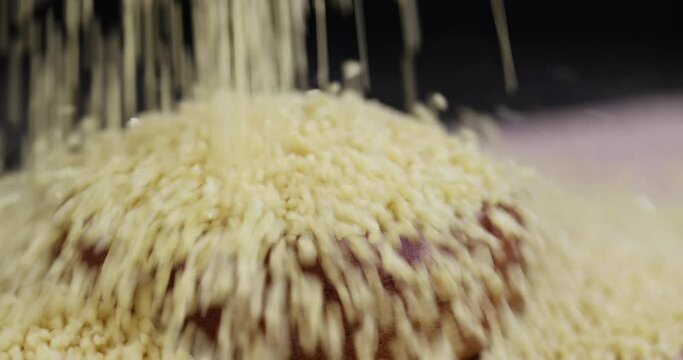 Sprinkle porridge couscous from wheat or millet, cooking dishes from traditional grits of crushed yellow couscous
