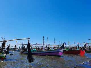 Indonesian traditional boats on the harbor in the mid day