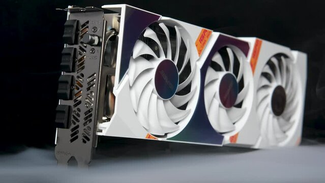 VGA Card, GPU, Graphic Card, Computer part with smoke rising and dark background