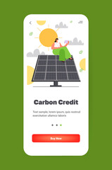 carbon credit concept woman using laptop on solar panel responsibility of co2 emission environmental conservation