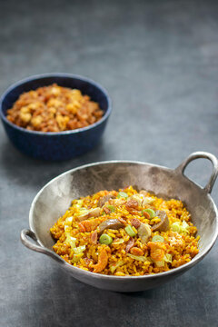 Fried Rice With Scramble Egg And Meatball, Cabbage Vegetables Such As Spring Onion, Shredded Chicken. Grey Background. Front View, Copy Space,