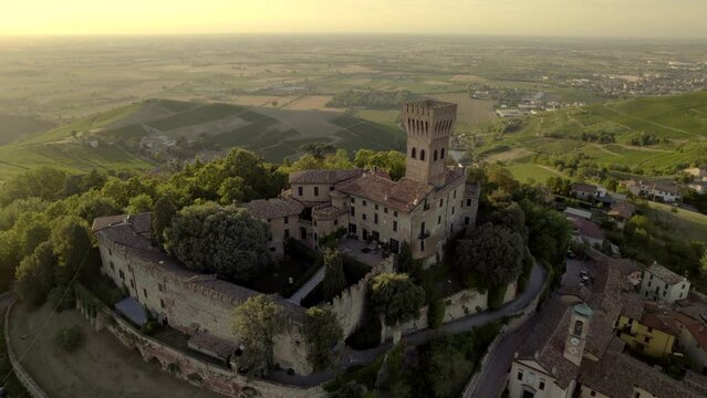 Aerial view of Cigognola Castle - vineyards and countryside in background, Oltrepo Pavese, Pavia, Lombardy, Italy 2