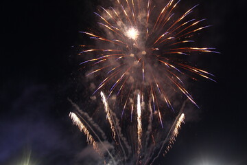 Fireworks fireworks on a black dark background. Holiday atmosphere. Independence Day Celebration