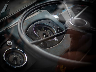 Dashboard and steering wheel of old-timer car