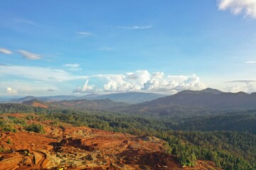 Fototapeta na wymiar Kendari - Indonesia, June 1, 2022: Beautiful landscape view at the Nickel Mining Company (PT. Tiran Indonesia Site Lameruru, North Konawe, Southeast Sulawesi).
