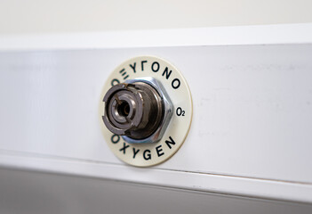 Typical view of an Oxygen socket translated in Greek Language, in a Greek hospital room