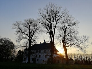  panorama of historical castle in Prerov nad Labem surrounded by village landscape