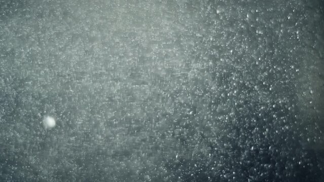 slow motion of bubbling water in detail. macro plan. background.