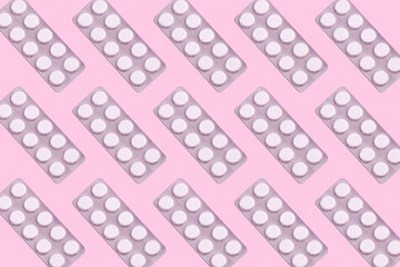 Medicines in packaging on a pink background. Flatlay. women's health, treatment, therapy, contraception, healthcare, painkillers, antidepressants, vitamins